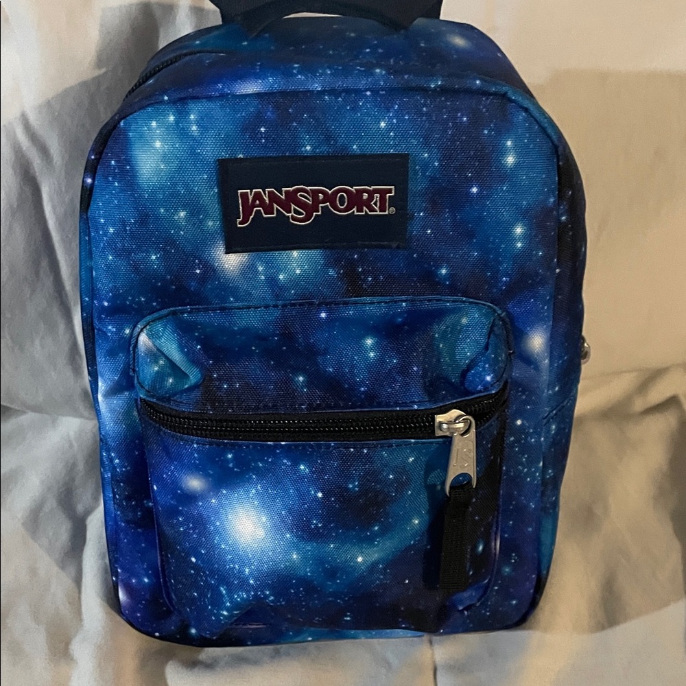 JanSport Navy and Blue Galaxy mini bag.
